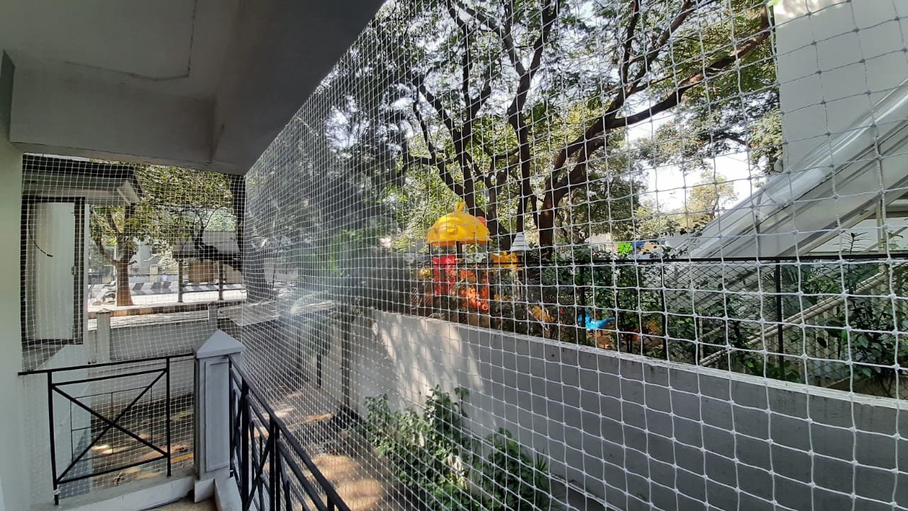 Balcony pigeon net installation