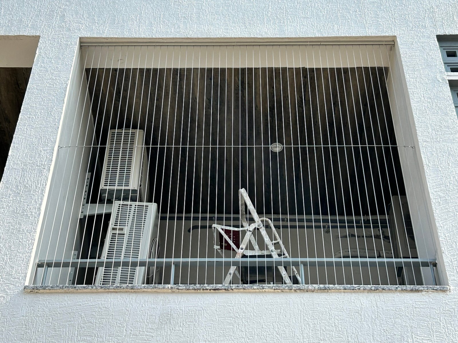Invisible grill for apartment windows